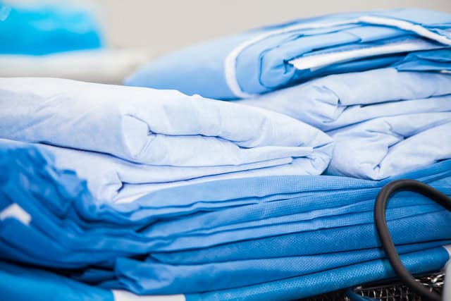 Hospital textile supply including bed linen scrubs and patient gowns Pakistan